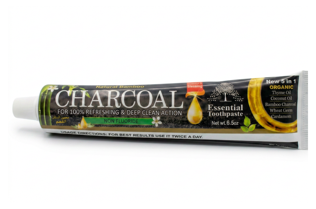 Tube of charcoal toothpaste on a white background